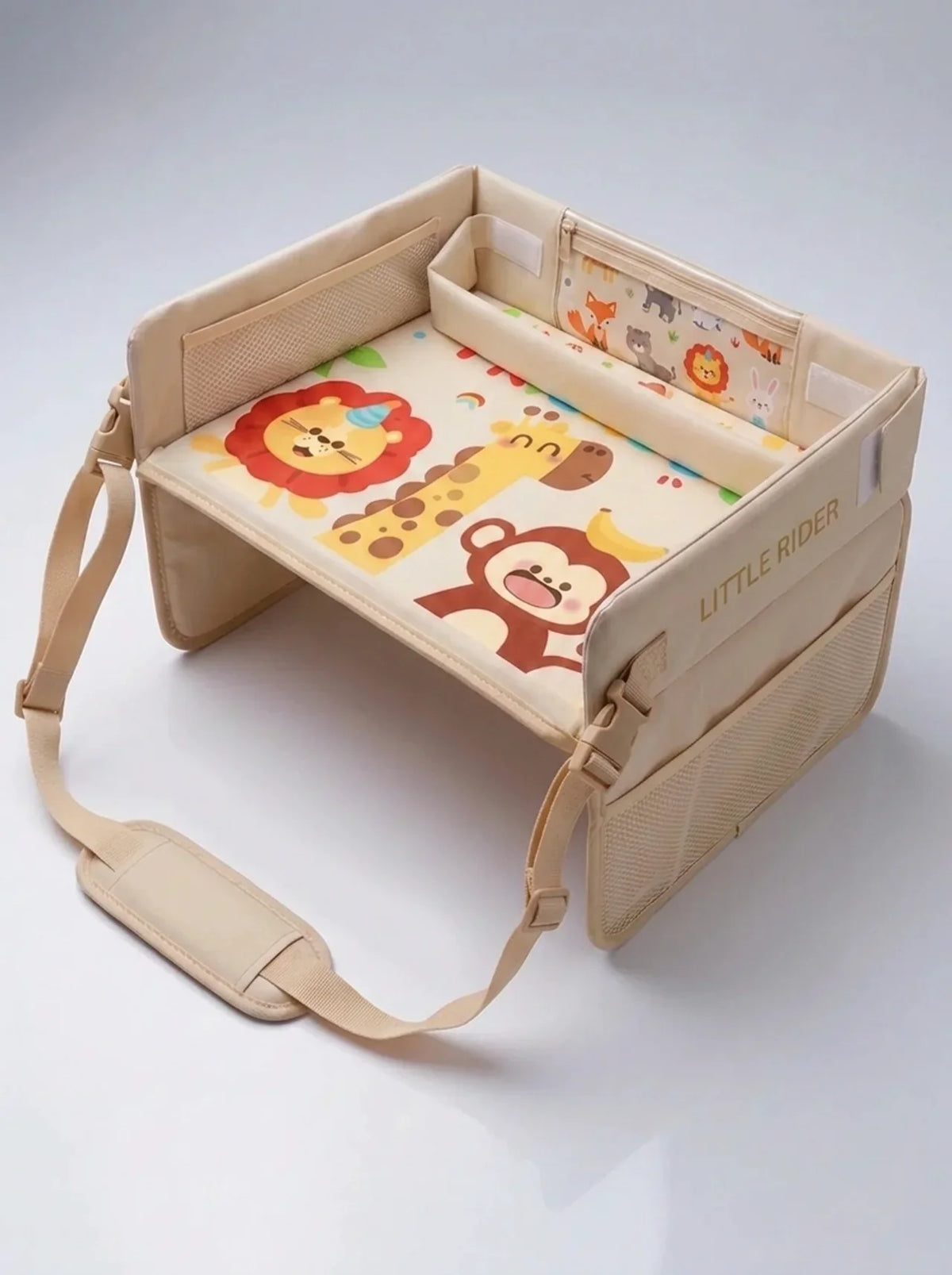 Beige Little Rider Travel Tray in use in a car seat