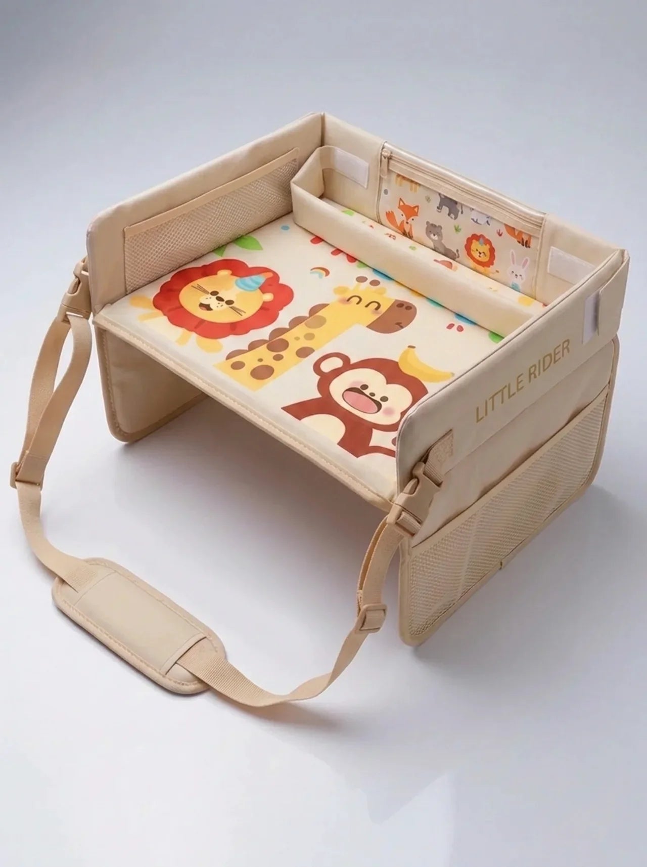 Beige Little Rider Travel Tray in use in a car seat